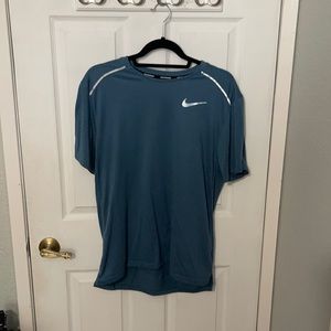Nike running shirt.